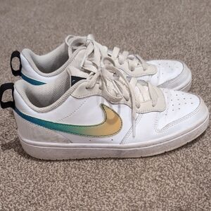 White Sneakers with Gold and Green Swoosh